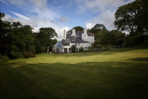 A picture of a large white house