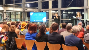 clare e potter addresses the audience at the Senedd